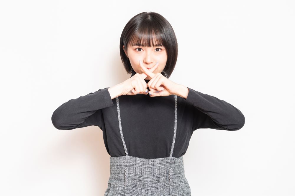 写真を断る女性